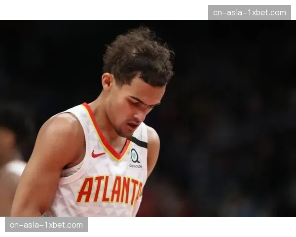 更衣室一幕：主教练向球员展示平板电脑，分析上场比赛丢失球权的位置图